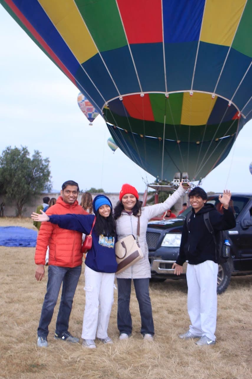 Prisha and family at a hot air balloon festival